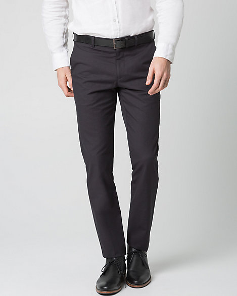Le Chateau - A stylish two-tone pant is cut from a breathable cotton blend, and finished in a flattering slim leg. Cotton blend. Low waisted, button closure. Belt included, suspender buttons. J-pockets, welt pockets. Slim leg. Rise: 8". 70% Cotton 30% Polyester. Imported.