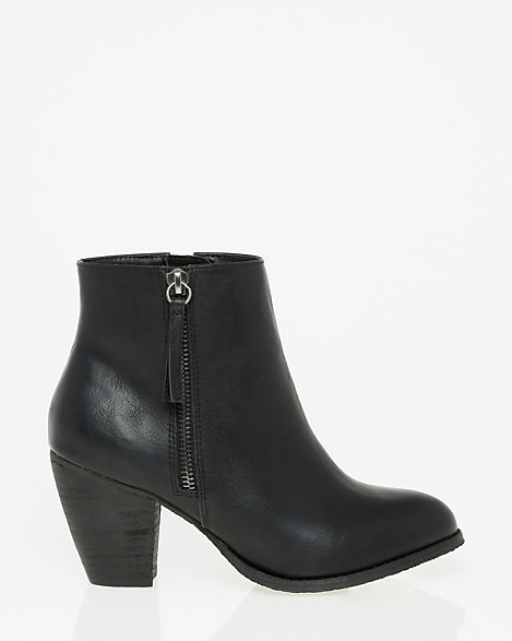 Le Chateau - A coveted cone heel lifts this versatile leather-like ankle boot designed with a chic side zipper. Synthetic upper. Cr pe sole. Cone heel, 2.75". 10.75" circumference, 4.5" shaft height. Measurements based on size 37. Almond toe, single sole. Zipper trim. Imported.