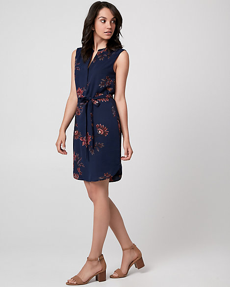 Le Chateau - Soak up the sun in an easy, floral print dress that's perfect for wherever the day takes you. Designed with soft shoulder pleats and a flattering waist tie. Cr pe de Chine. V-neck, sleeveless. Waist tie. Loose, rounded hem. 38" from high shoulder point. 100% Polyester. Imported.