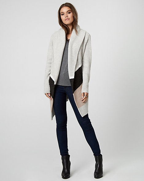Le Chateau - This colour block, knit sweater coat is the coziest and easiest transitional piece for off-duty style. Knit. Open-front, long sleeves. Straight hem. 30" from centre back. 59% Acrylic 18% Cotton 17% Nylon 5% Polyester 1% Spandex. Imported.